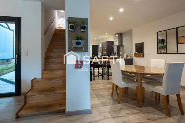 Maison de 124,5 m² avec patio et stationnement