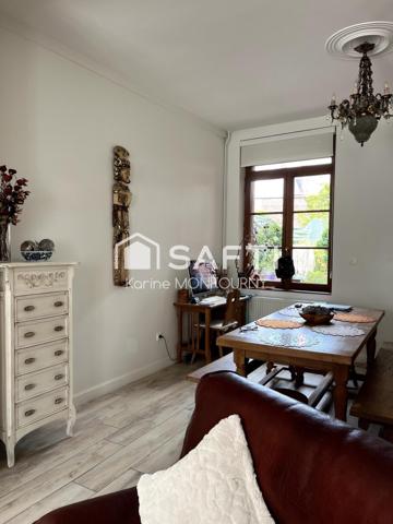 Maison avec petit jardin et cave