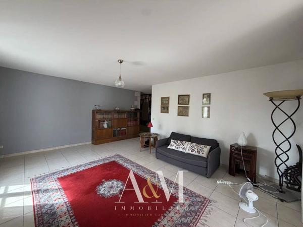 Appartement T4 de 90 m² + terrasse 14 m², cave et garage