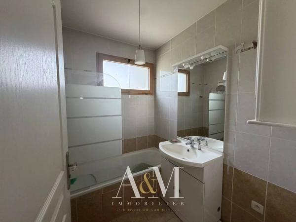 Appartement T4 de 90 m² + terrasse 14 m², cave et garage