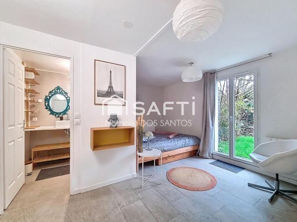 Charmant Studio avec espace chambre et jardin de 64m²