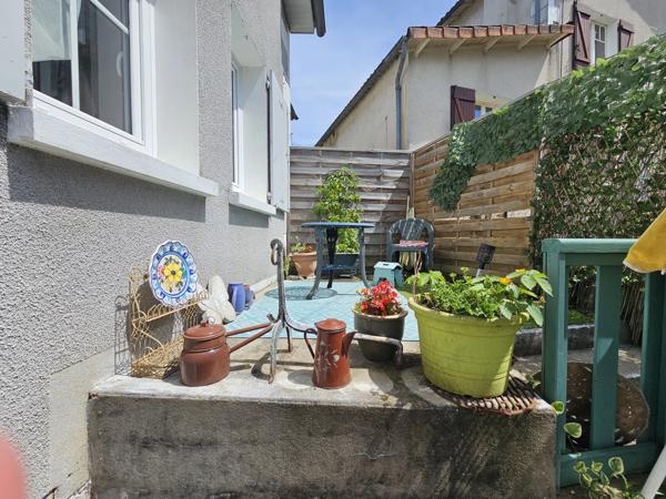 Charmante maison de ville avec jardin