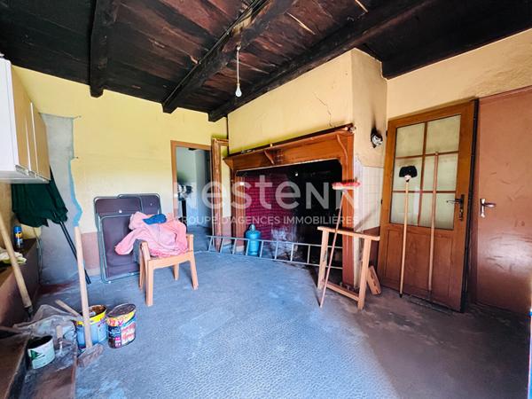 A vendre- Lagraulière- maison en pierre rénovée- grange- petite maison à rénover-puits-four à pain-1.2ha