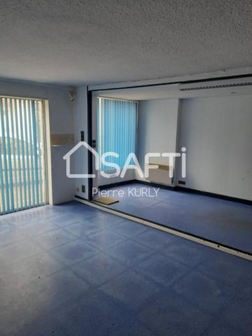 Bel appartement avec local commercial et dépendances