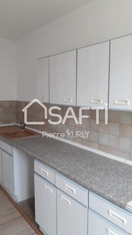 Bel appartement avec local commercial et dépendances