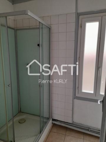 Bel appartement avec local commercial et dépendances