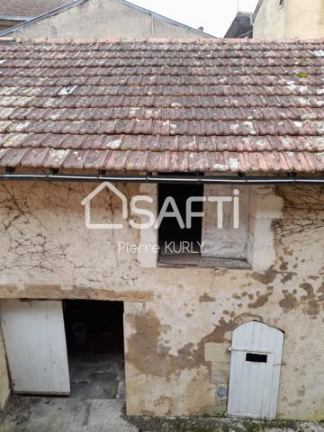 Bel appartement avec local commercial et dépendances