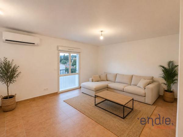 immeuble de rapport-166 m2-Appartement+Local commercial-Parkings privatifs.