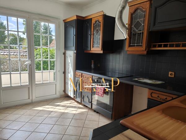 Maison,2 chambres,garage sur terrain clos de plus de 600m2