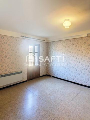 Maison de village avec jardin, cave et garage