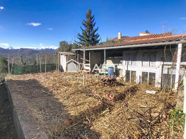 Maison de village avec jardin, cave et garage