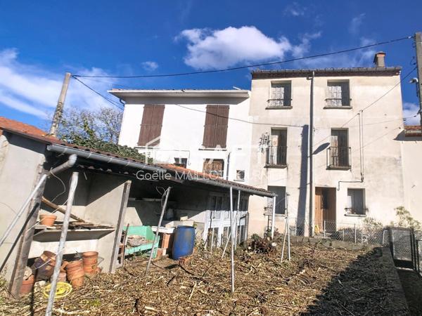 Maison de village avec jardin, cave et garage