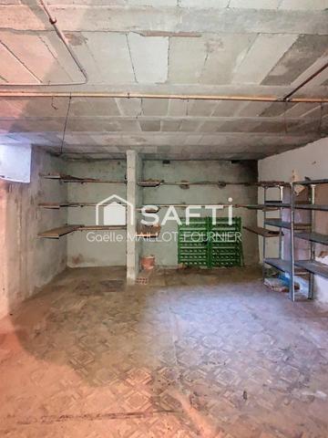 Maison de village avec jardin, cave et garage