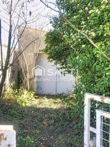 Maison de village avec jardin, cave et garage