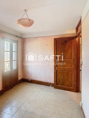 Maison de village avec jardin, cave et garage