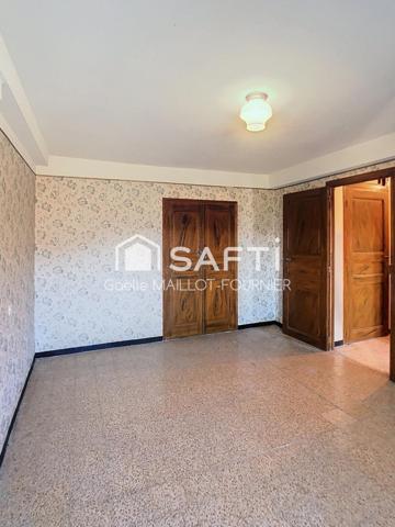 Maison de village avec jardin, cave et garage