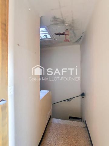 Maison de village avec jardin, cave et garage