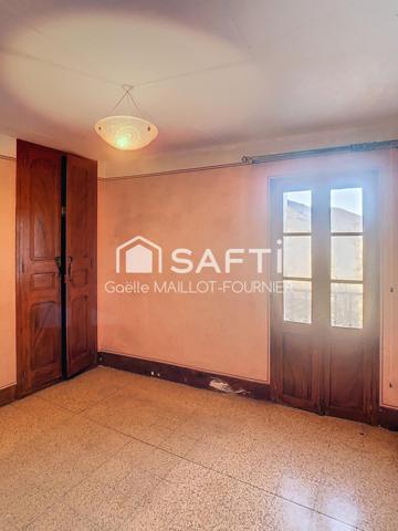 Maison de village avec jardin, cave et garage