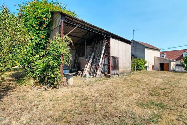 Maison avec terrain et nombreuses dépendances