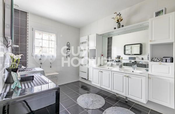 Maison spacieuse dans secteur recherché - 4 chambres, jardin et confort moderne