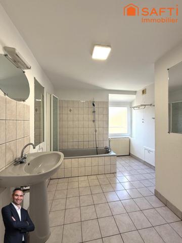 Superbe appartement de 4 pièces disposant deux caves, d'une place de stationnement privée et d'un garage !