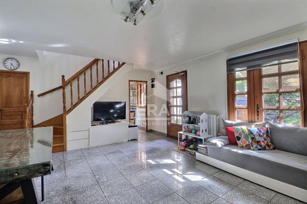 Maison familiale 4 pièces 111 m² avec jardin et garage à Saint-Denis