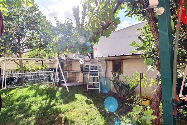 Maison familiale 4 pièces 111 m² avec jardin et garage à Saint-Denis