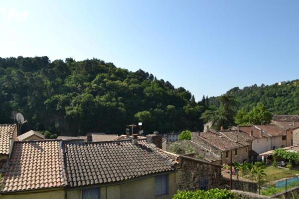 MAISON DE VILLAGE INDEPENDANTE EN PIERRE AVEC TERRAIN ATTENANT DE 460 m²