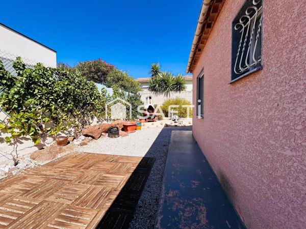 Maison plain-pied avec garage sur terrain de 380m2