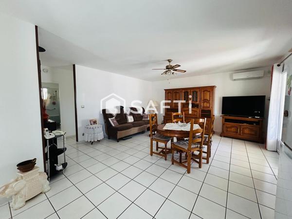 Maison plain-pied avec garage sur terrain de 380m2