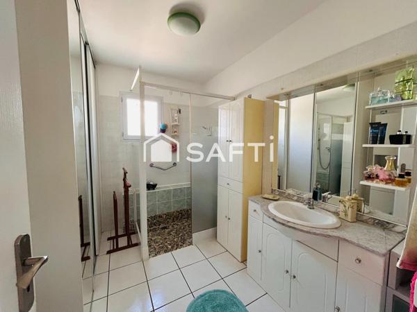 Maison plain-pied avec garage sur terrain de 380m2