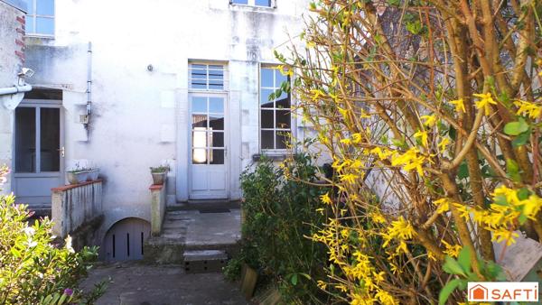 Maison de ville alliant charme et authenticité