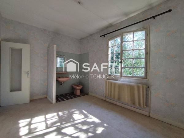 Maison sur sous sol total avec 7 chambres