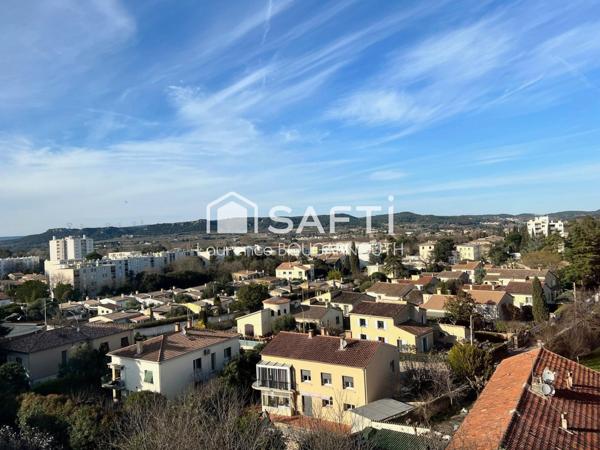 Appartement 4 pièces - 77 m² - Balcon et parking