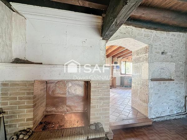 Ensemble immobilier composé de deux maisons avec de nombreuses dépendances