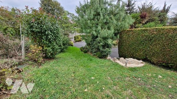 MAISON D'HABITATION comprenant