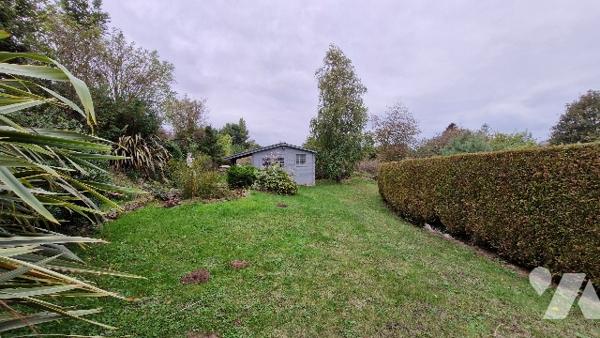 MAISON D'HABITATION comprenant