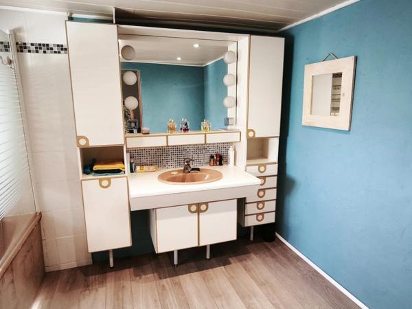 Maison familiale spacieuse avec 3 chambres, bureau, terrasse et garage – proche commodités