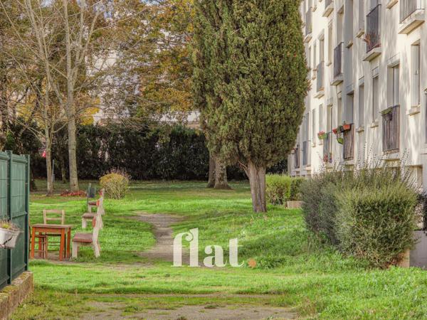 Appartement T4 / T3 - 62 m2 + cave + Jardin commun ( DPE D)