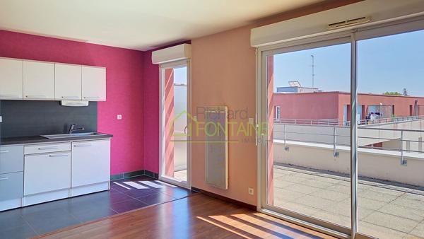 Appartement T2 en dernier étage avec grande terrasse et garage femé en sous-sol