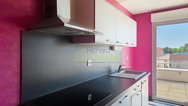 Appartement T2 en dernier étage avec grande terrasse et garage femé en sous-sol