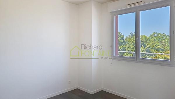 Appartement T2 en dernier étage avec grande terrasse et garage femé en sous-sol