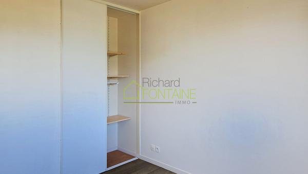 Appartement T2 en dernier étage avec grande terrasse et garage femé en sous-sol