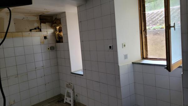 Immeuble avec  1 fond commercial et 2 appartements