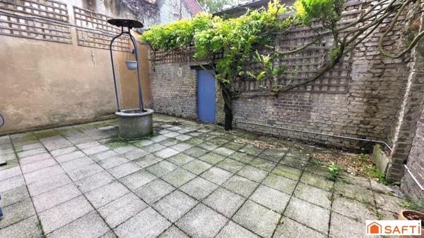 Grande maison bourgeoise T6 en cœur de ville avec grande cour et garage