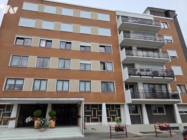 Appartement type 3 avec cave, parking et garage