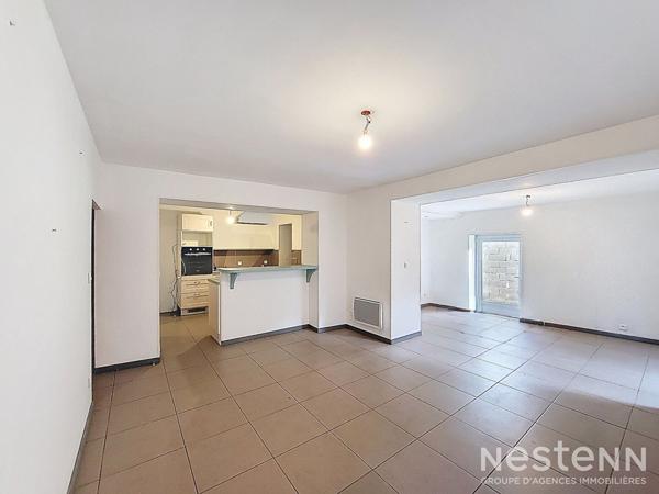 A Vendre Maison en pierre de 74 m² avec dépendance, terrasse et jardin au centre de Condom