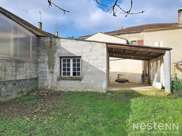 A Vendre Maison en pierre de 74 m² avec dépendance, terrasse et jardin au centre de Condom