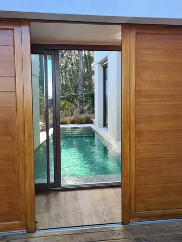 Cap Ferret, 2ème ligne, accès direct à la plage, jolie villa d’architecte de 120 m2 habitable, en prise directe avec le bassin, piscine et parking privé