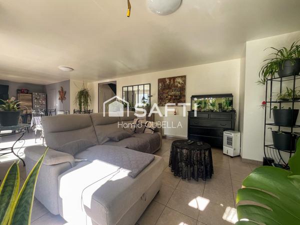 Maison de 112m2 sur un terrain de 479m2, 4 chambres, suite parentale de plain-pied, garage et jardin.